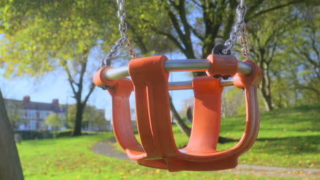Empty-playground-swing-with-slow-move-in