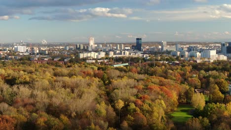 Slow-aerial-moving-side-view-of-Katowice-city-in-Poland-on-sunny-autumn-day