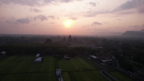Aerial-view-of-sunset-and-silhouette-of-Prambanan-Temple,-a-Hindu-temple-in-Indonesia