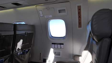 Interior-view-of-commercial-jet-emergency-exit