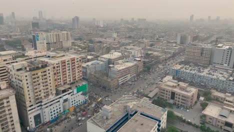Aerial-View-Of-Buildings-In-Karachi-With-Air-Pollution-Beside-MA-Jinnah-Road-Through-Hazy-Air