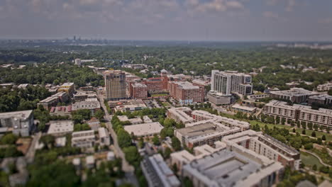 Atlanta-Georgia-Aerial-v904-hyperlpase-drone-flyover-O4W-capturing-PCM-in-the-neighborhood,-urban-park-and-Midtown-cityscape-with-tilt-shift-miniature-effect---Shot-with-Mavic-3-Pro-Cine---July-2023