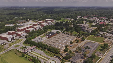 Atlanta-Georgia-Aerial-v973-drone-flyover-and-around-Tyler-Perry-studios,-capturing-the-film-production-complex-in-Fort-McPherson-from-above-at-daytime---Shot-with-Mavic-3-Pro-Cine---August-2023