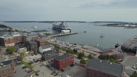Aerial-Shot-Of-Cruise-Ship-Docked-At-Portland-Harbor,-Maine