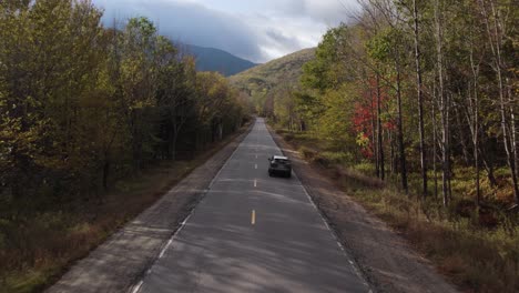 Car-Driving-In-Grafton-Notch-State-Park,-Maine