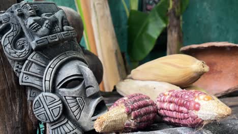 Maya-gods-sculpture-with-mais-corn-as-primary-source-of-food-in-the-Yucatan-riviera-maya-Mexico
