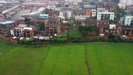 Urban-farming-shot-shows-farms-within-a-city-with-buildings-and-farmland-side-by-side-Madagascar,-Africa
