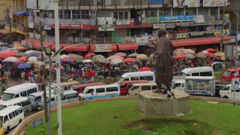 Aerial-established-of-Adam-market-with-crowded-busy-road-with-pedestrian-and-small-buses