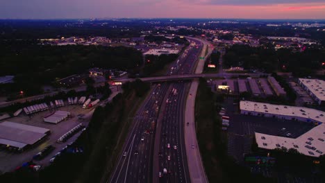 Aerial-shot-of-cityscapes-and-transportation-in-Marietta,-Georgia,-USA_forward-drone-shot