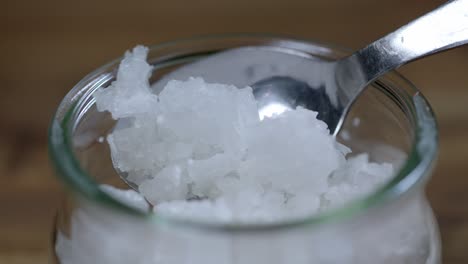 Close-up-of-coarse-sea-salt-in-a-jar
