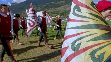 Contrada-della-Corte,-Association-of-flag-wavers-and-musicians-marches-into-the-South-Tyrolean-medieval-games