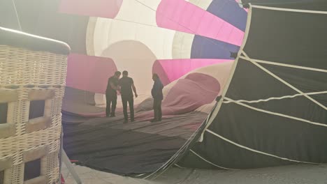 Aviation-safety-check-inspection-inside-hot-air-balloon-envelope