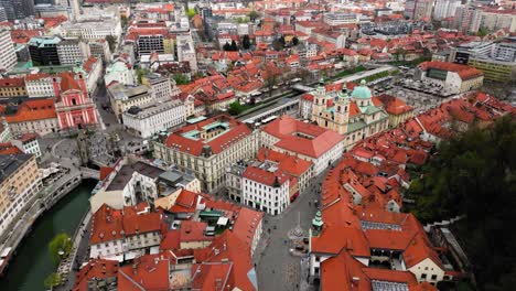 Cinematic-Drone-Shot-of-a-Busy-Old-Town-in-Ljubljana,-the-Capital-City-of-Slovenia