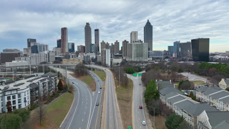 Establishing-aerial-shot-of-Downtown-Atlanta-buildings,-Atlanta-city-at-sunrise,-Skyscrapers-and-skyline-buildings-in-modern-urban-American-city,-GA,-USA