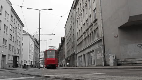 Red-tram-in-the-bw-city