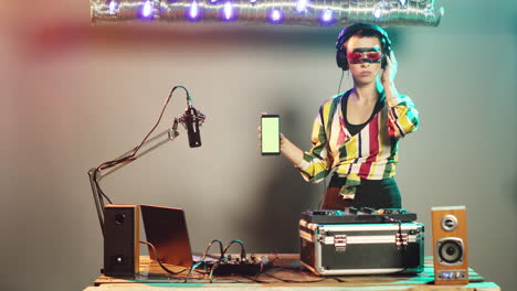 DJ-artist-shows-greenscreen-template-while-she-uses-turntables