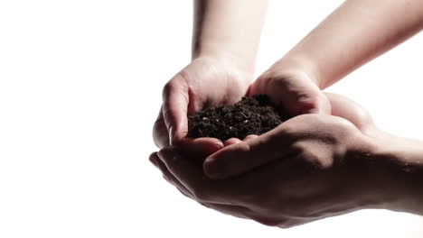 Man-hands-support-woman-hands-with-soil