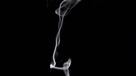 Thin-smoke-on-a-black-background