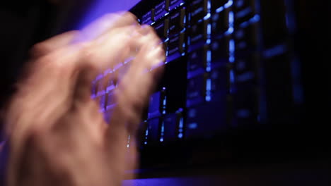 Man-hands-typing-on-the-blue-keyboard-Time-lapse