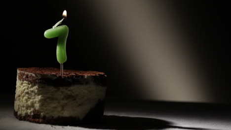 Candle-seven-in-tiramisu-cake
