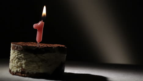 Candle-one-in-tiramisu-cake
