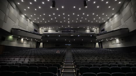 Man-applauds-alone-in-the-theater