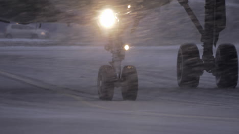 Plane-wheels-on-runaway-in-heavy-snowfall