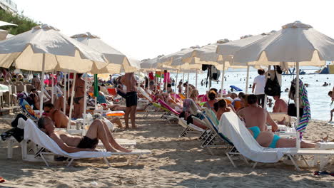 Crowded-summer-beach-at-a-resort