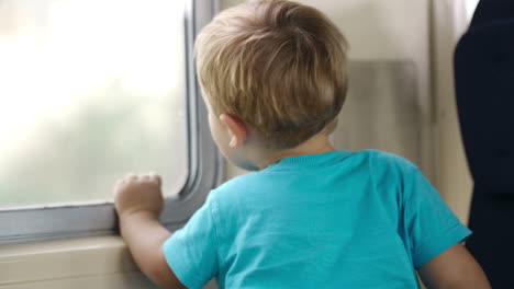 Little-boy-and-his-mother-in-the-train