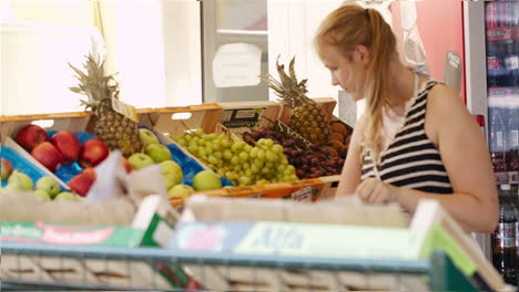 Young-woman-shopping-for-fresh-fruit