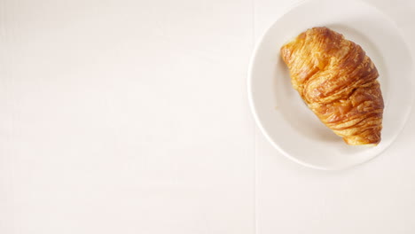 Coffee-and-croissant-for-breakfast