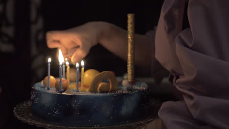 Lighting-the-candles-on-birthday-cake