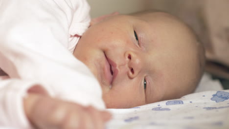 Newborn-baby-falling-asleep-after-feeding