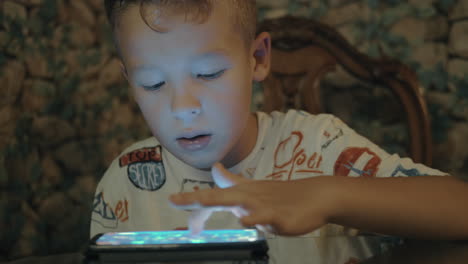 Boy-playing-on-smart-phone