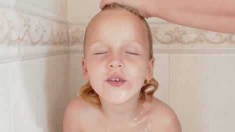 Little-girl-having-evening-shower