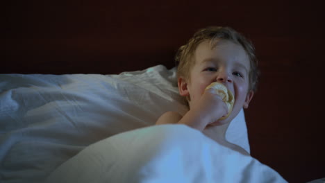 Boy-eating-in-bed