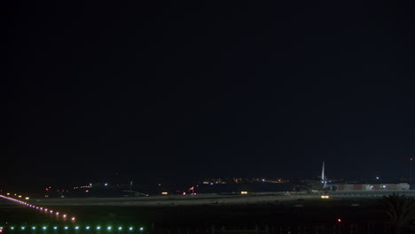 Airplane-at-night-airport