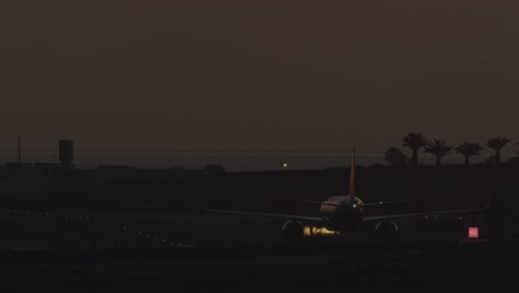 Airplane-taxiing-down-the-runway