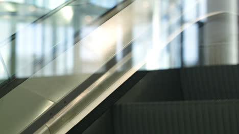 Close-up-shot-of-escalator-going-up