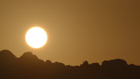 Sun-disc-rising-in-morning-sky