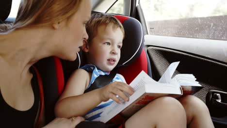 Mother-talking-to-son-while-they-in-the-car