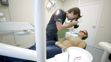 Dentist-making-photo-of-patients-smile