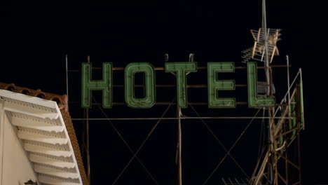 Timelapse-of-hotel-banner-blinking-at-night