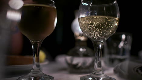 Pouring-wine-into-empty-glass-in-restaurant