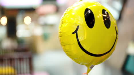 Smiling-balloon-floating-in-the-air