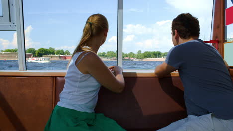 Man-and-woman-having-a-trip-on-boat
