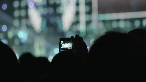 People-on-the-Concert-Taking-Photos-of-the-Stage
