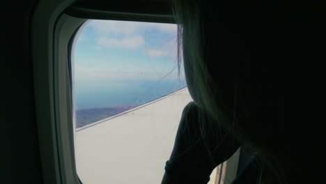 Flying-in-the-plane-and-enjoying-view-from-height