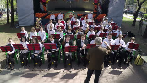 Children-orchestra-performing-outdoor-aerial-view