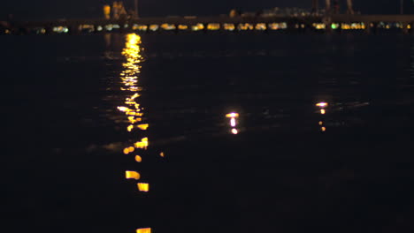 Senior-couple-and-candles-in-night-sea